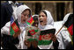 Students sing as they welcome Mrs. Laura Bush to the future site of the Ayenda Learning Center Sunday, June 8, 2008, in Bamiyan, Afghanistan. White House photo by Shealah Craighead