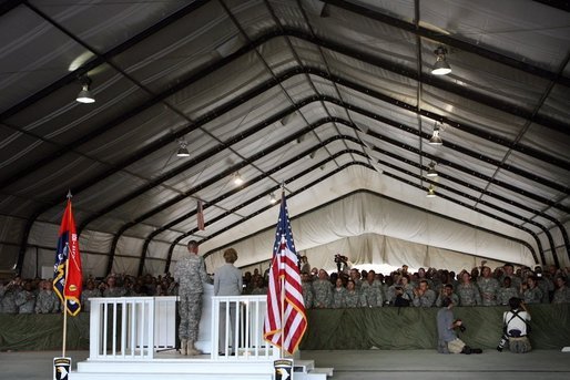 Mrs. Laura Bush delivers remarks to US troops during her visit to Bagram Air Force Base Sunday, June 8, 2008, in Bagram, Afghanistan. White House photo by Shealah Craighead