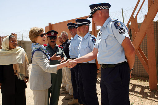 Mrs. Laura Bush greets New Zealand Police officers Sunday, June 8, 2008, during her visit to the Police Training Academy in Bamiyan, Afghanistan. Mrs. Bush traveled to Afghanistan to highlight the continued U.S. commitment to the country and its President Hamid Karzai. White House photo by Shealah Craighead