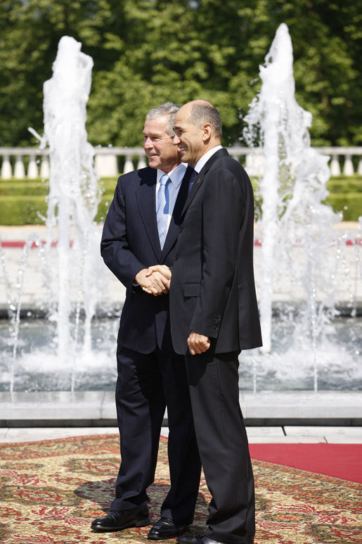 President George W. Bush shakes hands with Slovenia's Prime Minister Janez Janša following a meeting at Brdo Castle Tuesday, June 10, 2008, in Kranj, Slovenia. White House photo by Eric Draper