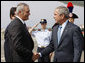 President George W. Bush shakes hands with U.S. Ambassador to Italy Ronald Spogli after arriving Wednesday, June 11, 2008, at Ciampino International Airport in Rome. White House photo by Eric Draper