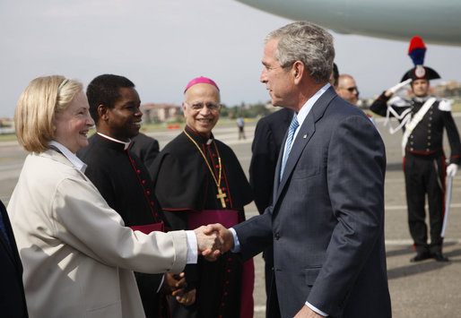 President George W. Bush is greeted upon his arrival in Rome Wednesday, June 11, 2008, by U.S. Ambassador to the Holy See Mary A. Glendon. White House photo by Eric Draper