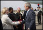 President George W. Bush is greeted upon his arrival in Rome Wednesday, June 11, 2008, by U.S. Ambassador to the Holy See Mary A. Glendon. White House photo by Eric Draper