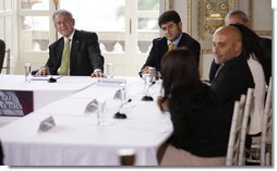 President George W. Bush listens to participants at a roundtable meeting on business exchanges Thursday, June 12, 2008, at the Villa Aurelia in Rome.  White House photo by Eric Draper