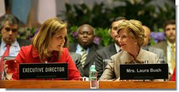 Mrs. Laura Bush sits with United Nations’ World Food Program Executive Director Josette Sheeran during the plenary session at the WFP conference in Rome on June 12, 2008. President Bush is also in Italy for three days. White House photo by Shealah Craighead