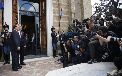 President George W. Bush and Italian Prime Minister Silvio Berlusconi pose for photographers Thursday, June 12, 2008, at the Villa Madama in Rome. White House photo by Eric Draper