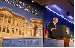 President George W. Bush addresses the Organization for Economic Co-operation and Development Friday, June 13, 2008, in Paris, saying "America and Europe are cooperating to widen the circle of development and prosperity." White House photo by Shealah Craighead