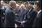 President George W. Bush stops to talk with U.S. veterans Saturday, June 14, 2008 in Paris. White House photo by Eric Draper