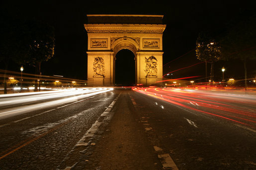 Traffic passes by the Arc de Triomphe in Paris early Saturday morning, June 14, 2008. White House photo by Chris Greenberg