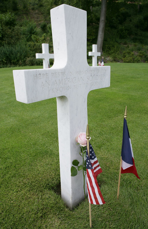 A headstone at the Suresnes American Cemetery and Memorial in Paris reads: "Here Rests in Honored Glory an American Soldier Known but to God." President George W. Bush visited the cemetery during his visit to the City of Lights Saturday, June 14, 2008. White House photo by Chris Greenberg