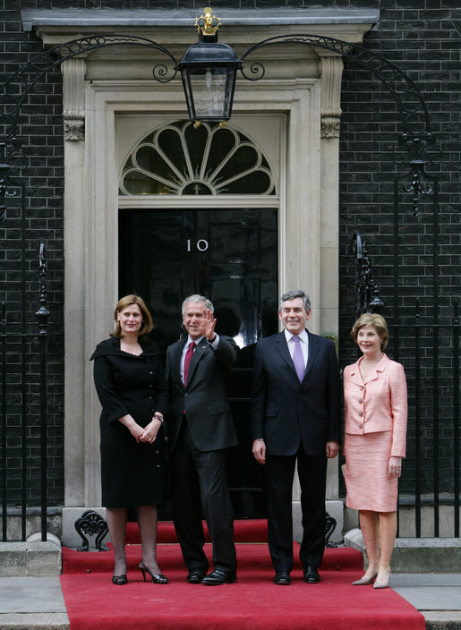 President George W. Bush waves to members of the media as he and Laura Bush are met by British Prime Minster Gordon Brown and his wife, Sarah, on their arrival Sunday, June 15, 2008 to 10 Downing Street in London. White House photo by Chris Greenberg