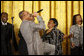 Singer Walter Hawkins performs on stage in the East Room of the White House, where he was joined on stage by his brother, Edwin, Tuesday, June 17, 2008, in honor of Black Music Month. White House photo by Eric Draper