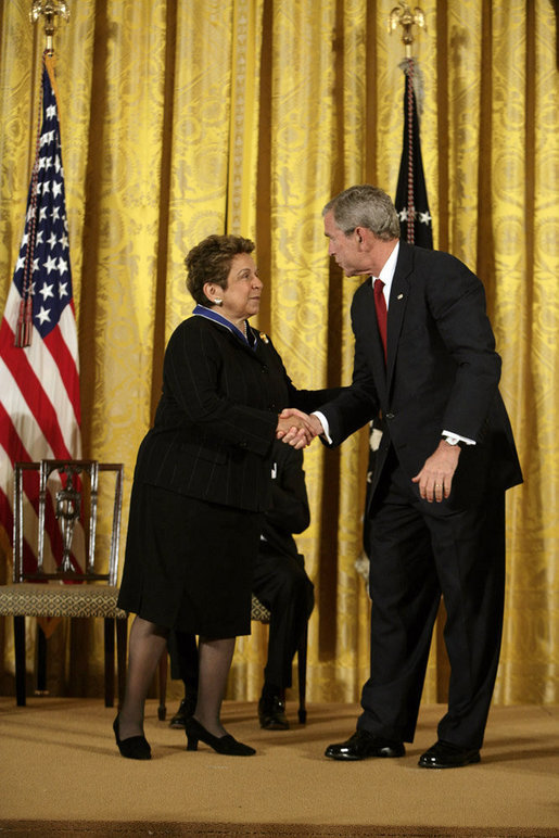 President George W. Bush shakes hands with Donna Shalala after presenting her with the Presidential Medal of Freedom Thursday, June 19, 2008, during the Presidential Medal of Freedom ceremony in the East Room at the White House. White House photo by David Bohrer