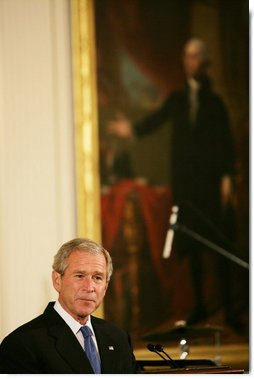 President George W. Bush welcomes guests Thursday evening, June 19, 2008 to the East Room of the White House, during a social dinner in honor of American jazz. White House photo by Chris Greenberg