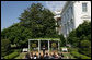 Mrs. Laura Bush delivers remarks in honor of World Refugee Day Friday, June 20, 2008, in the East Garden of the White House. In addressing her guests, Mrs. Bush announced the approval by President George W. Bush of a $32.8 million emergency funding to support unexpected and urgent needs, including food, for refugees and conflict victims in Africa, the Middle East, Asia and the Western Hemisphere. White House photo by Shealah Craighead