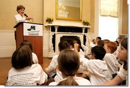 During remarks, Mrs. Bush calls on a student to name a type of plant they planted earlier in the day during National Park First Bloom event at the Charlestown Navy Yard in Boston, MA, Sunday, June 22, 2008. White House photo by Shealah Craighead