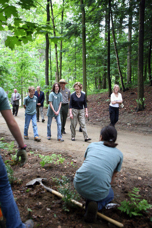 Mrs. Laura Bush walks on a trail in the Marsh-Billings-Rockefeller National Historical Park Monday, June 23, 2008, in Woodstock, Vt. With her are Rolf Diamant, park superintendent, and students of the Service-Learning program. President Bush has proclaimed June 2008 as Great Outdoors Month to celebrate the grandeur of our open spaces, strengthen our commitment to preserving this heritage, and reaffirm our dedication to protecting our air, water, and lands. White House photo by Shealah Craighead