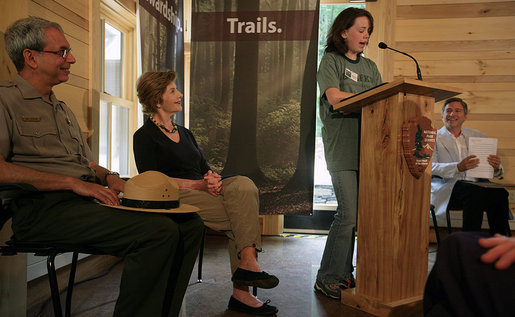 Mrs. Laura Bush listens to Rachel Allen, a student in the Service-Learning Program, as she delivers remarks during an Active Trails! event at Marsh-Billings-Rockefeller National Historical Park Monday, June 23, 2008, in Woodstock, Vt. Also shown are Rolf Diamant, Superintendent of Marsh-Billings-Rockefeller National Historical Park, and Vin Cipolla, President of the National Parks Foundation. Mr. Cipolla just announced a $50, 000 grant from the National Park Foundation to the Marsh-Billings-Rockefeller National Historical Park to connect the Forest Center to the Woodstock Trails Network. White House photo by Shealah Craighead