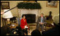 President George W. Bush welcomes President Gloria Macapagal-Arroyo of the Republic of the Philippines to the Oval Office Tuesday, June 24, 2008, at the White House. The President expressed deep condolences for those affected by Typhoon Fengshen saying, "We, the American people, care about the human suffering that's taking place, and we send our prayers." White House photo by Eric Draper