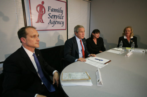 President George W. Bush participates in a roundtable discussion on Housing Counseling, Tuesday, July 1, 2008, as Secretary of Housing and Urban Development Steve Preston looks on at Family Service Agency Inc. in North Little Rock, Arkansas. White House photo by Joyce N. Boghosian