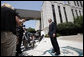 President George W. Bush speaks to reporters Thursday, July 3, 2008 outside the National Naval Medical Center in Bethesda, Md., to congratulate the Colombian government for their successful hostage rescue. White House photo by Eric Draper