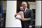 President George W. Bush congratulates new United States Citizens at Monticello's 46th Annual Independence Day Celebration and Naturalization Ceremony Friday, July 4. 2008, in Charlottesville, VA. White House photo by Joyce N. Boghosian