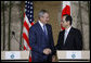 President George W. Bush and Prime Minister Yasuo Fukuda of Japan shake hands after their joint press availability Sunday, July 6, 2008, in Toyako on the northern Japanese Island of Hokkaido. White House photo by Eric Draper