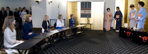 Mrs. Laura Bush participates in an Urasenke Tea Ceremony during a traditional Japanese cultural program for spouses of G-8 leaders Monday, July 7, 2008, at the Windsor Hotel Toya Resort and Spa in Toyako, Japan. White House photo by Shealah Craighead