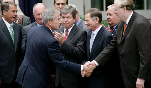 President George W. Bush shakes hands Thursday, July 10, 2008, with Senator Jay Rockefeller of West Virginia, after signing the FISA Amendments Act of 2008 in the Rose Garden at the White House. White House photo by Chris Greenberg