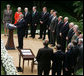 President George W. Bush, joined by members of his Cabinet and members of Congress, addresses his remarks Thursday, July 10, 2008, prior to signing the FISA Amendments Act of 2008 in the Rose Garden at the White House. White House photo by Joyce N. Boghosian