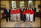 President George W. Bush welcomes the 2008 MATHCOUNTS National Competition Award winners to the Oval Office at the White House, Tuesday, July 15, 2008. From left are, math coach Jeffrey Boyd of Sugarland, Texas; Ding Zhou of Houston, Texas; Kevin Tian of Austin, Texas; Kevin Li of College Station, Texas; Darryl Wu of Bellevue, Wash.; coach Kristian Klaene of Lexington, Ky.; Anderson Wang of Ambler, Pa.; coach Lon-Chan Chu of Redmond, Wash.; Evan Miller of Owenboro, Ky., and coach David Hallas of Pittsburgh, Pa. White House photo by Eric Draper