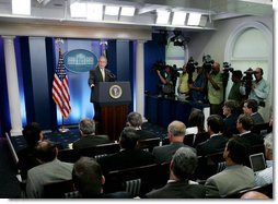 President George W. Bush answers a reporter's question during a news conference Tuesday, July 15, 2008, in the James S. Brady Press Briefing Room of the White House.  White House photo by Joyce N. Boghosian