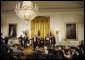 Jorge Celedon, Jimmy Zambrano, and their performance group perform during the celebration of Colombian Independence Day Tuesday, July 22, 2008, in the East Room of the White House. White House photo by Eric Draper