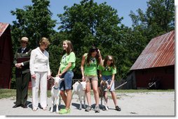 Mrs. Laura Bush meets students holding goats Monday, July 28, 2008, during a tour of the Old Goat Barn at the Carl Sandburg Home National Historic Site in Flat Rock, N.C. Mrs. Bush participated in Junior Ranger program events at the historical site and announced a $50,000 grant in support of the Junior Ranger programs. White House photo by Shealah Craighead