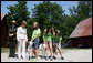 Mrs. Laura Bush meets students holding goats Monday, July 28, 2008, during a tour of the Old Goat Barn at the Carl Sandburg Home National Historic Site in Flat Rock, N.C. Mrs. Bush participated in Junior Ranger program events at the historical site and announced a $50,000 grant in support of the Junior Ranger programs. White House photo by Shealah Craighead