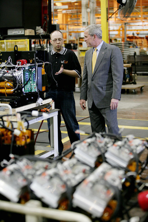 President George W. Bush speaks with a worker during his tour of the Lincoln Electric Company in Euclid, Ohio, on Tuesday, July 29, 2008, where President Bush also addressed remarks on energy and economic issues. White House photo by Chris Greenberg