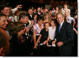 President George W. Bush poses for photos and meets with guests at the 2008 Annual Meeting of the West Virginia Coal Association, Thursday July 31, 2008 in White Sulphur Springs, W.Va. White House photo by Joyce N. Boghosian