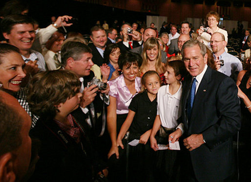 President George W. Bush poses for photos and meets with guests at the 2008 Annual Meeting of the West Virginia Coal Association, Thursday July 31, 2008 in White Sulphur Springs, W.Va. White House photo by Joyce N. Boghosian