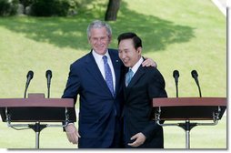 President George W. Bush embraces South Korean President Lee Myung-bak at the conclusion of their joint news conference Wednesday, Aug. 6, 2008, at the Blue House presidential residence in Seoul, South Korea. White House photo by Chris Greenberg