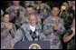 President George W. Bush is applauded as he delivers his remarks to U.S. Army military personnel stationed at the U.S. Army Garrison-Yongsan Wednesday, August 6, 2008, in Seoul, South Korea. Chris Greenberg White House photo by Chris Greenberg