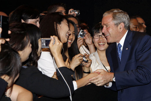 President George W. Bush greets United States Embassy personnel and family members Wednesday, Aug. 6, 2008, in Seoul. White House photo by Eric Draper