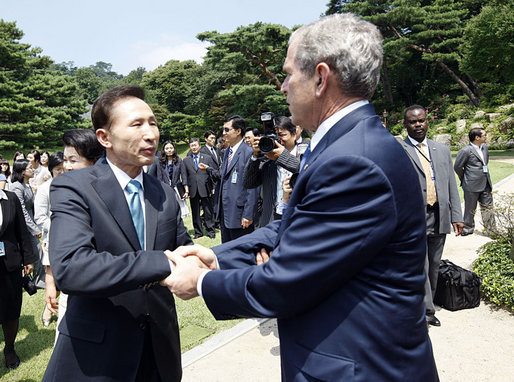 President George W. Bush shakes hands with South Korean President Lee Myung-bak before leaving the Blue House Wednesday, Aug. 6, 2008, in Seoul. White House photo by Eric Draper