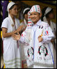 Residents of the Mae La Refugee Camp at Mae Sot, Thailand, perform traditional dance for Mrs. Laura Bush during her visit to the camp on the Burma border on Aug. 7, 2008. It has been almost 20 years since the August 8, 1988 crackdown in Burma which began forcing residents from the country. Many of the people in the Mae La Refugee Camp and the other eight camps along the border have been born in the camps or lived most of their lives in the camps, waiting for conditions to improve in Burma or to move to the United States and other countries. White House photo by Shealah Craighead