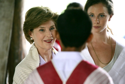 Mrs. Laura Bush and daughter Ms. Barbara Bush, right, visit a grammar class at the Mae La Refugee Camp at Mae Sot, Thailand, on August 7, 2008. At least 39,000 Burmese have gathered at this camp to escape oppression in their country. The camp is the largest of nine refugee camps in Thailand. White House photo by Shealah Craighead