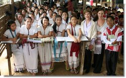 During her visit to the Mae La Refugee Camp in Mae Sot, Thailand, Mrs. Laura Bush visits with a class studying grammar. Mrs. Bush's daughter, Ms. Barbara Bush is to the right of Mrs. Bush in the Aug. 7, 2008 visit. The camp, the largest of nine on the border, houses at least 39,000 refugees fleeing the oppression in Burma. White House photo by Shealah Craighead