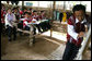 Mrs. Laura Bush sits in on a grammar class during her visit on Aug. 7, 2008 to the Mae La Refugee Camp at Mae Sot, Thailand. The camp, the largest of nine in Thailand, houses at least 39,000 Burmese refugees, many of whom home to resettle in the United States if conditions do not permit them to return to their home country. White House photo by Shealah Craighead