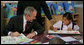 President George W. Bush visits with children on August 7, 2008, in Bangkok at the Human Development Foundation - Mercy Centre, a non-profit organization which helps the children and communities of the many slums of Bangkok. The group builds and operates schools, works on issues concerning family health and welfare – such as protecting street children's rights and combating AIDS. The President followed the event by dealing with the issues of Burmese disaster relief and meeting with Burmese activists and media before heading to China. White House photo by Chris Greenberg