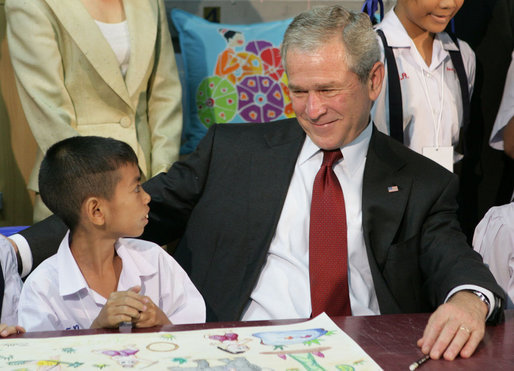 President George W. Bush visits with children on August 7, 2008, in Bangkok at the Human Development Foundation - Mercy Centre, a non-profit organization which helps the children and communities in the slums of Bangkok. The group builds and operates schools, works on issues concerning family health and welfare. The President followed the event by dealing with the issues of Burmese disaster relief and meeting with Burmese activists and media before heading to China. White House photo by Chris Greenberg