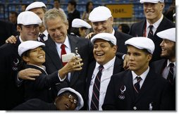 President George W. Bush shares a moment with members of the U.S. Olympic team Friday, Aug. 8, 2008, in Beijing prior to Opening Ceremony of the 2008 Summer Olympic Games. White House photo by Eric Draper