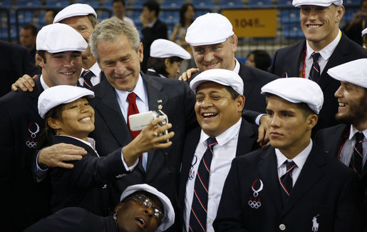 President George W. Bush shares a moment with members of the U.S. Olympic team Friday, Aug. 8, 2008, in Beijing prior to Opening Ceremony of the 2008 Summer Olympic Games. White House photo by Eric Draper